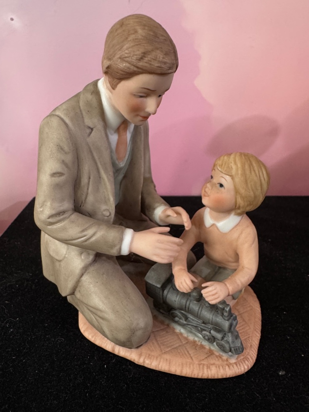 Vintage Treasured Memories porcelain figurine titled "The New Train". 1983